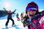 woman-enjoying-snowboarding-vivid-mountain-setting